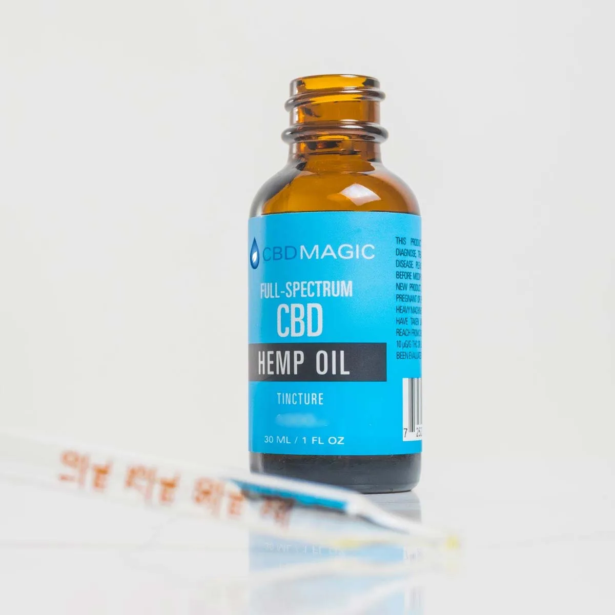 full spectrum cbd hemp oil 500mg bottle and dropper